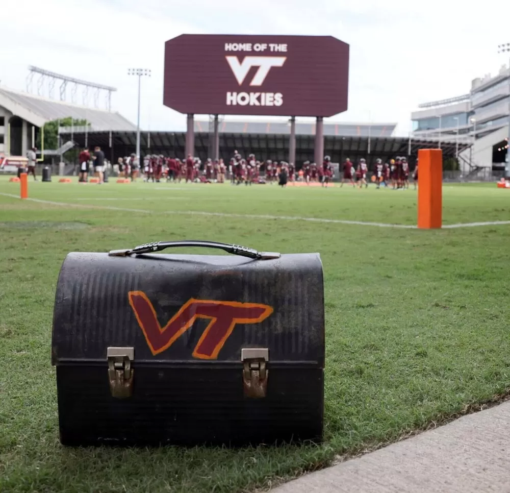 A Sky-High Scare: Skydiver Crashes into Scoreboard at Virginia Tech Spring Game